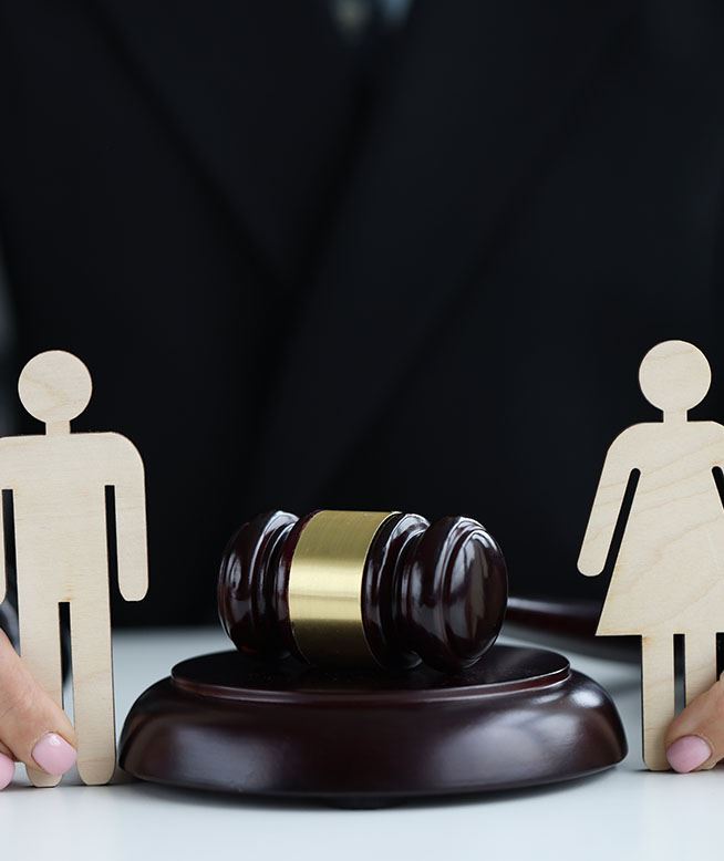 cut out of man and woman next to gave;