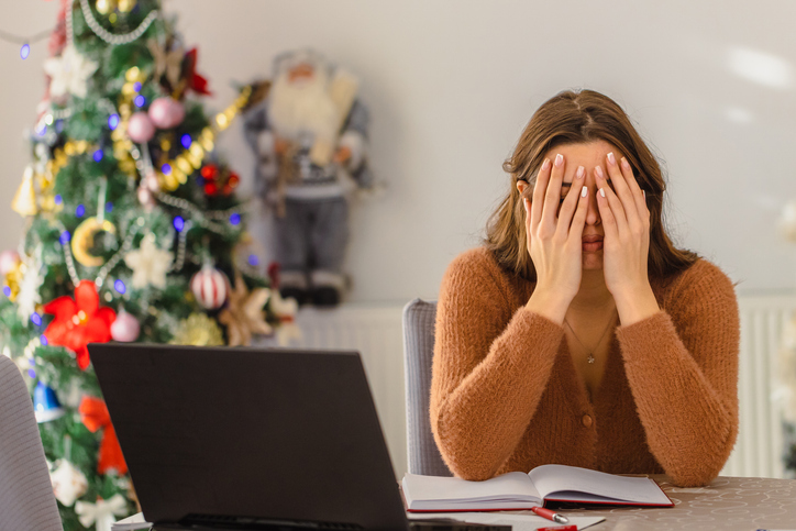 Woman looking distressed during the holidays